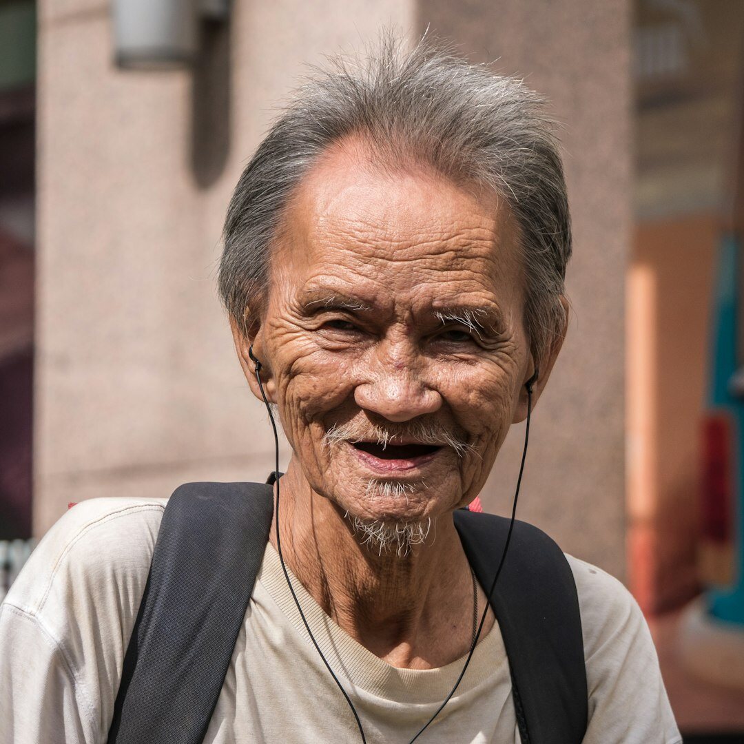 Portrait of a cheerful senior Slovak man with a moustache