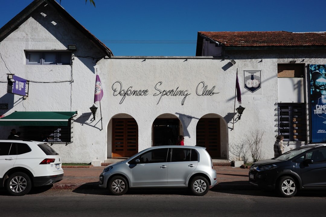 Volunteers and seniors gathered in front of a community club building