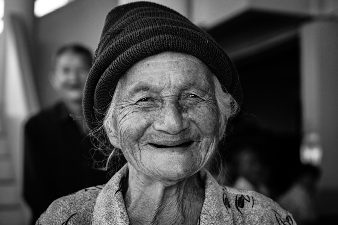 senior woman smiling at event